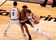 爱游戏在线-猛龙逆转山东队，东契奇带队取胜